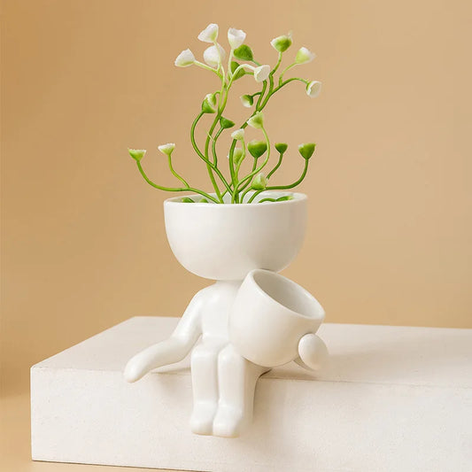 Human Sitting Ceramic Vase